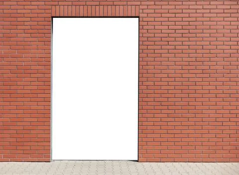 Brick Wall with Empty Door Frame Stock-Fotos