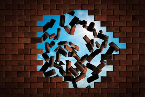 Brick wall falling down making a hole to sunny sky outside Stock Photos