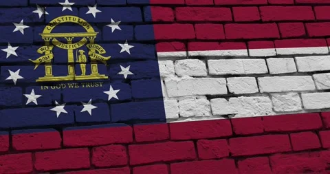 A brick wall with the georgia state flag of the United States of America 스톡 동영상 337428735