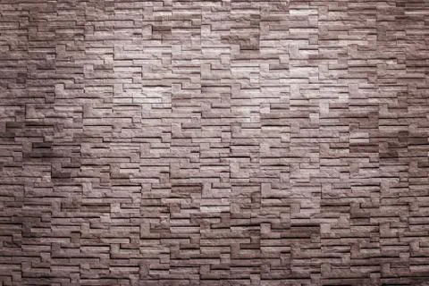 Brick wall in gray background Stock Photos