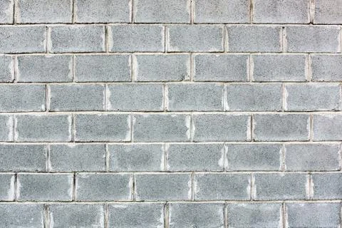 A brick wall of gray bricks, background, texture Stock Photos