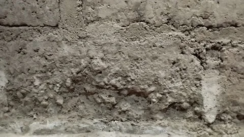 This is a brick wall that has fallen down at Singaraja's house Stock Footage 218062116