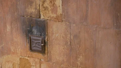 The brick wall of the house with the burnt part Видео 137360691