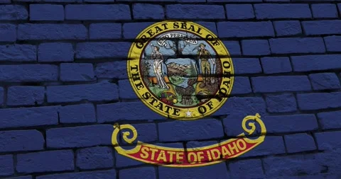 A brick wall with the idaho state flag of the United States of America Vidéo 337429004