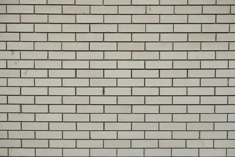 Brick wall light background close-up Stock Photos