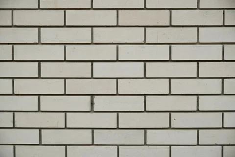 Brick wall light background close-up Stock Photos