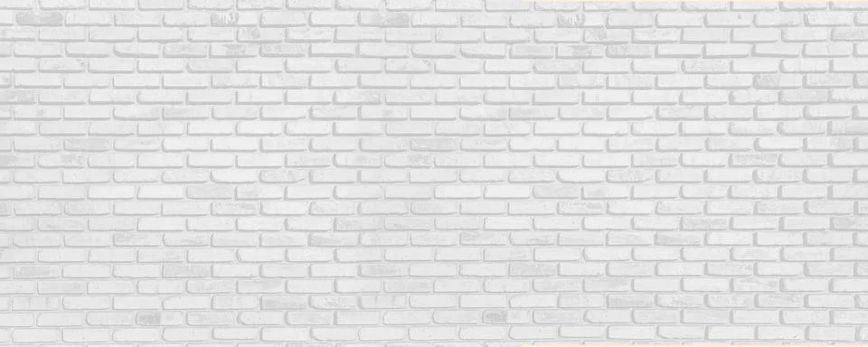 Brick wall with light gray bricks. 스톡 사진