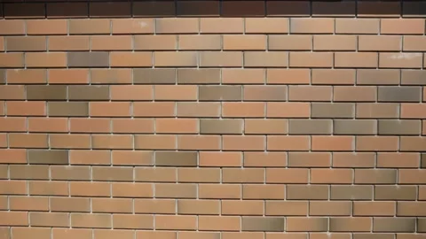 Brick wall made of modern facing bricks. Video stock 225890296