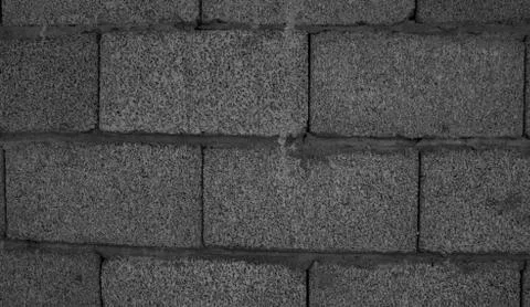 Brick wall made of stone Stock Photos