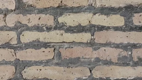 Brick wall made of thin bricks. Background without finishing Stock Footage 247463129