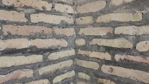 Brick wall made of thin bricks. Background without finishing Stock Footage 249689295