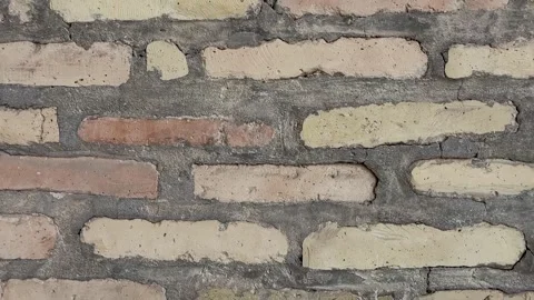 Brick wall made of thin bricks. Background without finishing Stock Footage 252270427