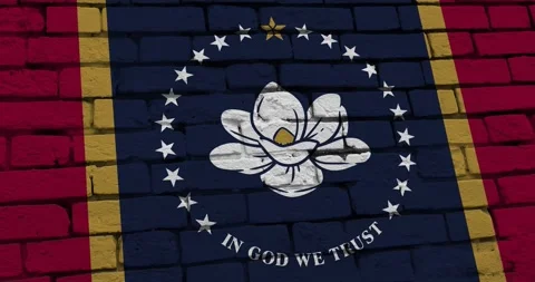 A brick wall with the Mississippi state flag of the United States of America Video stock 337429805