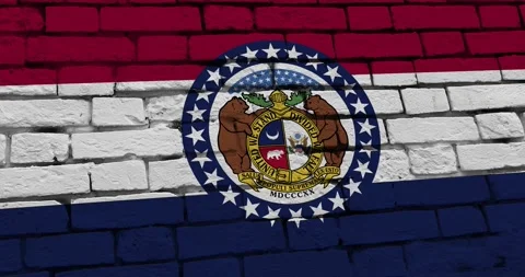 A brick wall with the Missouri state flag of the United States of America 스톡 동영상 337429807