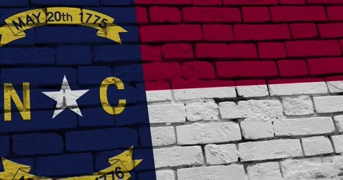 Brick wall with the north carolina state flag of the United States of America Stockbeeldmateriaal 337429876