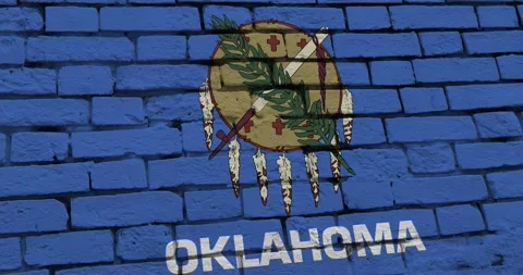 A brick wall with the oklahoma state flag of the United States of America Vídeos de archivo 337431114