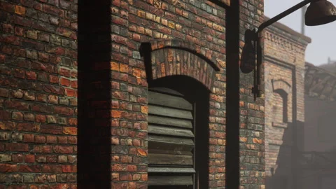 Brick wall of an old building in a city during a foggy morning Stock Footage 343530449