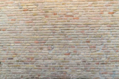 Brick wall in old stone Stock Photos