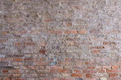 Brick wall in old stone Stock Photos