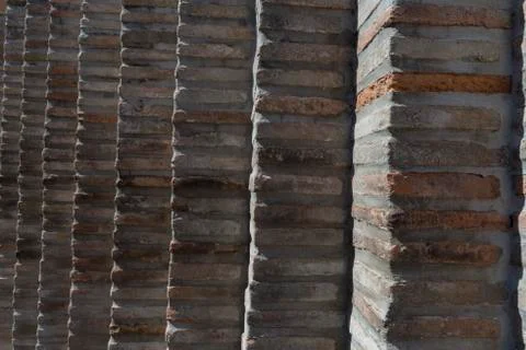 Brick wall in old stone Stock Photos