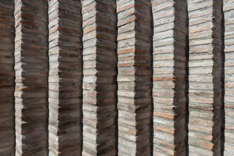 Brick wall in old stone Stock Photos