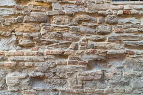 Brick wall in old stone Stock Photos