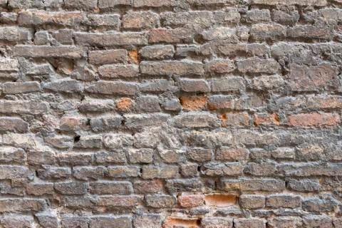 Brick wall in old stone Stock Photos