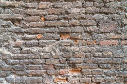 Brick wall in old stone Stock Photos