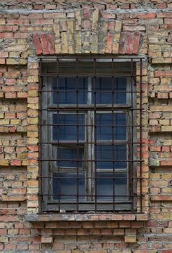 Brick Wall with old Window Guard Stock Photos