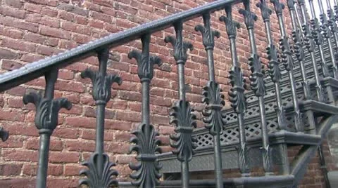 Brick wall, ornate ironwork Stock Footage