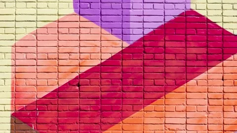 Brick wall painted in different colors. Colored brick wall, brick animation Stock Footage 300962082