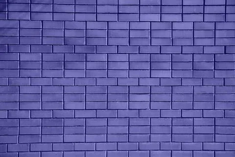 Brick wall painted with paint surface for background. Brick wall. Close-up. O Stock Photos