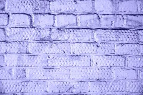 Brick wall painted with paint surface for background. Brick wall. Close-up. O Stock Photos