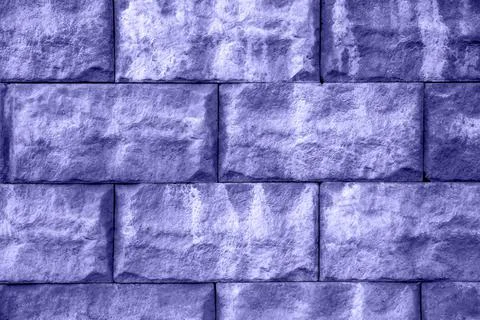 Brick wall painted with paint surface for background. Brick wall. Close-up. Old Stock Photos