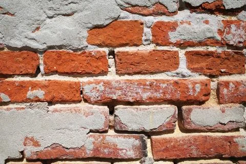 Brick wall with plaster close-up Stock Photos