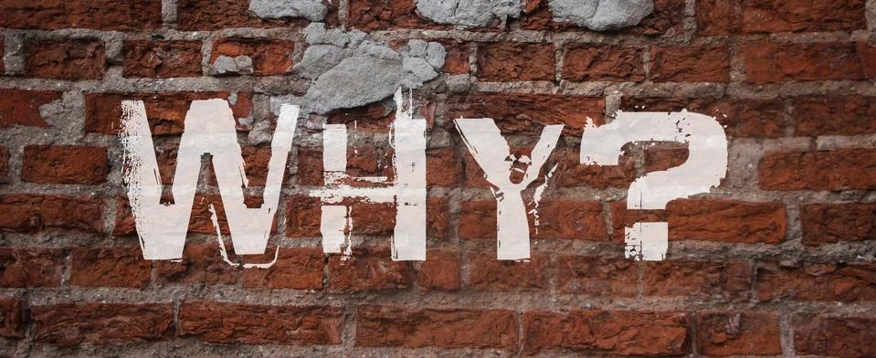 Brick wall with question WHY. Concept background Stock Photos