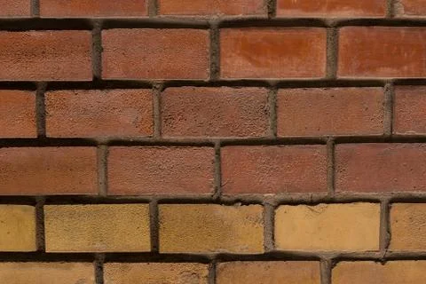 Brick wall rectangular brown block base grunge urban design base close-up web Foto stock