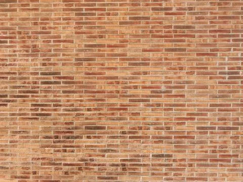 Brick wall with a red brick pattern Stock Photos