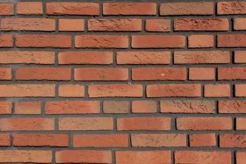 Brick wall of red color. Texture Stock Photos