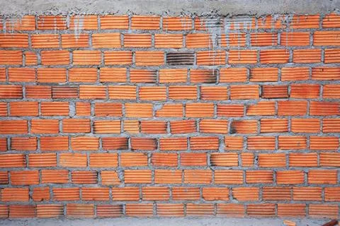 Brick wall in residential building construction site Stock Photos