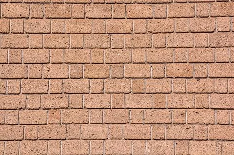 A brick wall with a rough texture Stock Photos