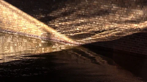 Brick wall in running water and the sunbeam Stock Footage 39712645