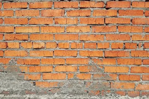 Brick wall soiled with concrete, background, texture Stock Photos