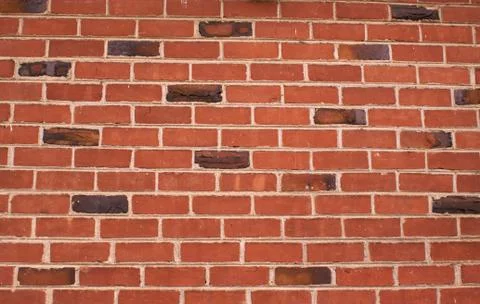 Brick wall with some klinkers Stock Photos