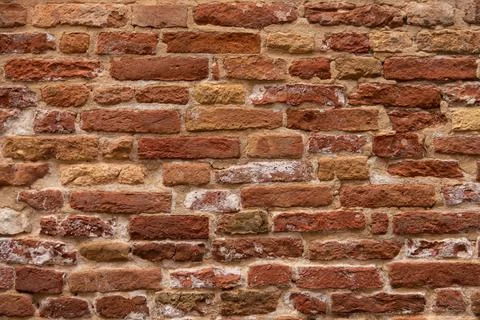 Brick wall structure of an old house Stock Photos