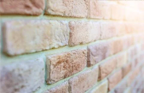 Brick wall with sunlight Stock Photos