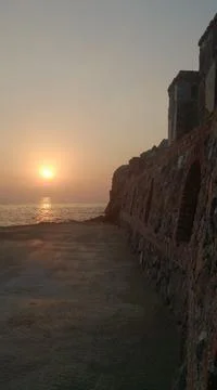 Brick wall at sunset, background Stock Photos