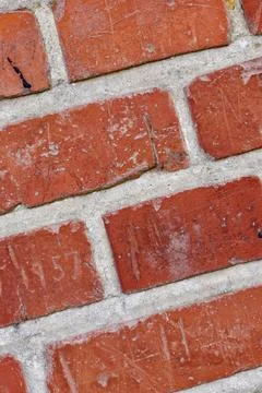 Brick wall, texture and cement in city architecture for building, concrete and Fotos de archivo