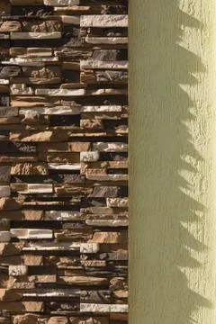 Brick wall texture and white wall. Urban background Stock Photos
