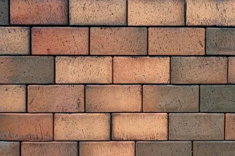 Brick wall texture background close-up Stock Photos